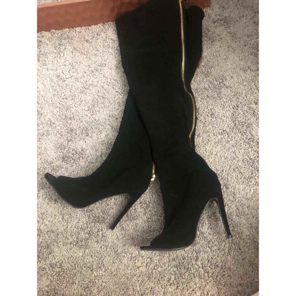 Black thigh high heel boots